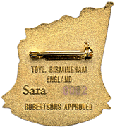 The reverse of Sara's Badge